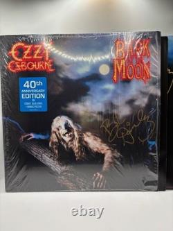 Bob Daisley Signed Ozzy Bark at the Moon Blue Vinyl Beckett Authentication
