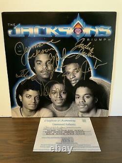 Jacksons Triumph Vinyl LP Record SIGNED BY MICHAEL JACKSON & 5 Jacksons COA