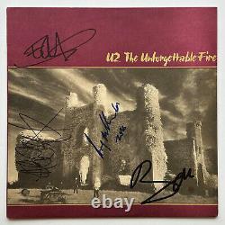 U2 autographed vinyl record album signed by all 4 fire bono edge Beckett BAS coa