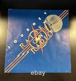 ALBUM VINYLE PROMO SIGNE PAR LE GROUPE JOURNEY 'RAISED ON RADIO' X4 AUTOGRAFIE 1986 LP