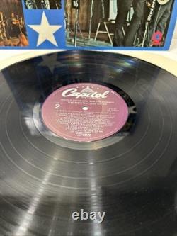 Album de vinyle signé par Merle Haggard 'The Fighting Side'