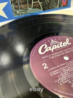 Album de vinyle signé par Merle Haggard 'The Fighting Side'
