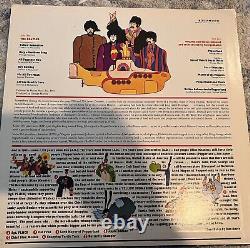 Album vinyle Beatles Yellow Submarine signé par les 4 membres + COA
