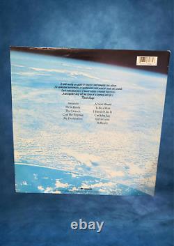 Boston a signé un disque vinyle Third Stage avec 6 signatures