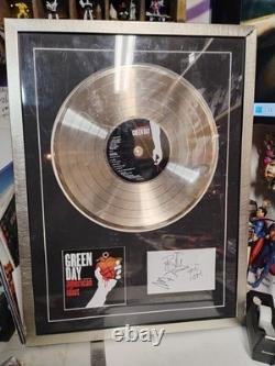 DISQUE D'OR VINYLE SIGNÉ AUTOGRAPHE PAR LE GROUPE GREEN DAY AMERICAN IDIOT RARE