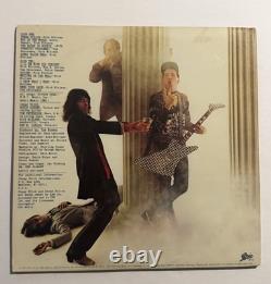 Disque vinyle Cheap Trick signé par tout le groupe, autographié par Robin Zander et Nielsen, avec certificat d’authenticité (COA)