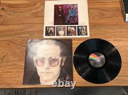 Disque vinyle LP de l’album Caribou d’Elton John, autographié et signé, avec pochette