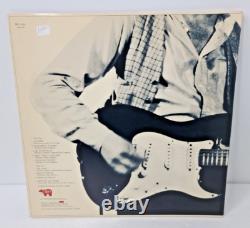 Disque vinyle LP dédicacé d'Eric Clapton Slowhand, signé à la main, certificat d'authenticité inclus