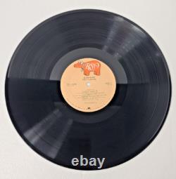 Disque vinyle LP dédicacé d'Eric Clapton Slowhand, signé à la main, certificat d'authenticité inclus