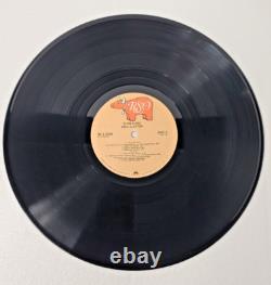 Disque vinyle LP dédicacé d'Eric Clapton Slowhand, signé à la main, certificat d'authenticité inclus