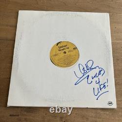 Disque vinyle signé 'Caught Up' d'Usher avec inscription et certificat d'authenticité