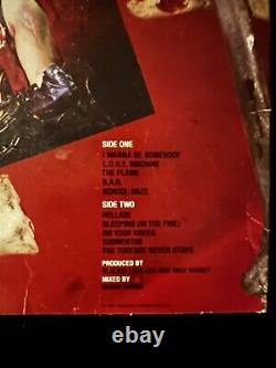 Disque vinyle signé de Blackie Lawless de W. A. S. P. Album