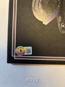 Disque vinyle signé par Billy Gibbons, album de ZZ Top 'Hardware'. Certificat d'authenticité Beckett.