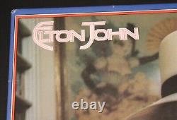 Elton John a signé un disque vinyle LP des plus grands succès avec certificat PSA DNA