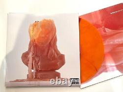Kesha a signé l'album High Road en vinyle de couleur orange avec autographe.