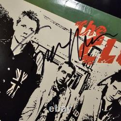 Le disque vinyle autographe de l'album éponyme de The Clash 4 signatures COA VEUILLEZ LIRE