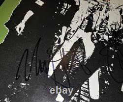 Le disque vinyle autographe de l'album éponyme de The Clash 4 signatures COA VEUILLEZ LIRE