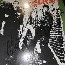 Le disque vinyle autographe de l'album éponyme de The Clash 4 signatures COA VEUILLEZ LIRE