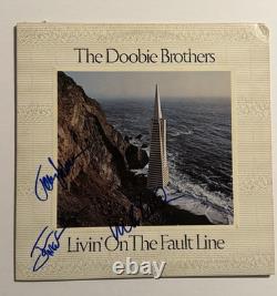 Le disque vinyle signé des Doobie Brothers autographe de Michael McDonald +2 COA