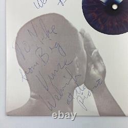 Le groupe The Tubes a signé l'album vinyle LP autographié 'Fully Signed' de l'extérieur