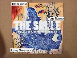 Le sourire signé - Disque vinyle autographié de Radiohead Thom Yorke Jonny Greenwood