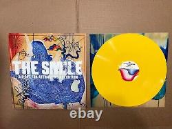 Le sourire signé - Disque vinyle autographié de Radiohead Thom Yorke Jonny Greenwood