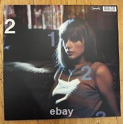 Taylor Swift Midnights Vinyle Bleu Pierre de Lune avec Insère Photo Signée à la Main