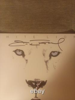 Vinyle LP 'White Lion Pride' signé par Mike Tramp COA JSA #CD46639