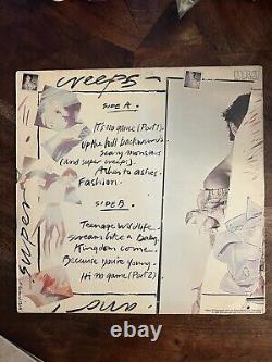 Vinyle LP signé par David Bowie Scary Monsters Super Creeps Record autographié.