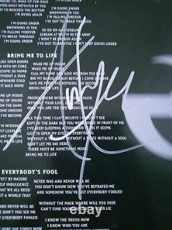Vinyle dédicacé 'Fallen' d'Evanescence avec la signature d'Amy Lee sur la pochette et l'insert.